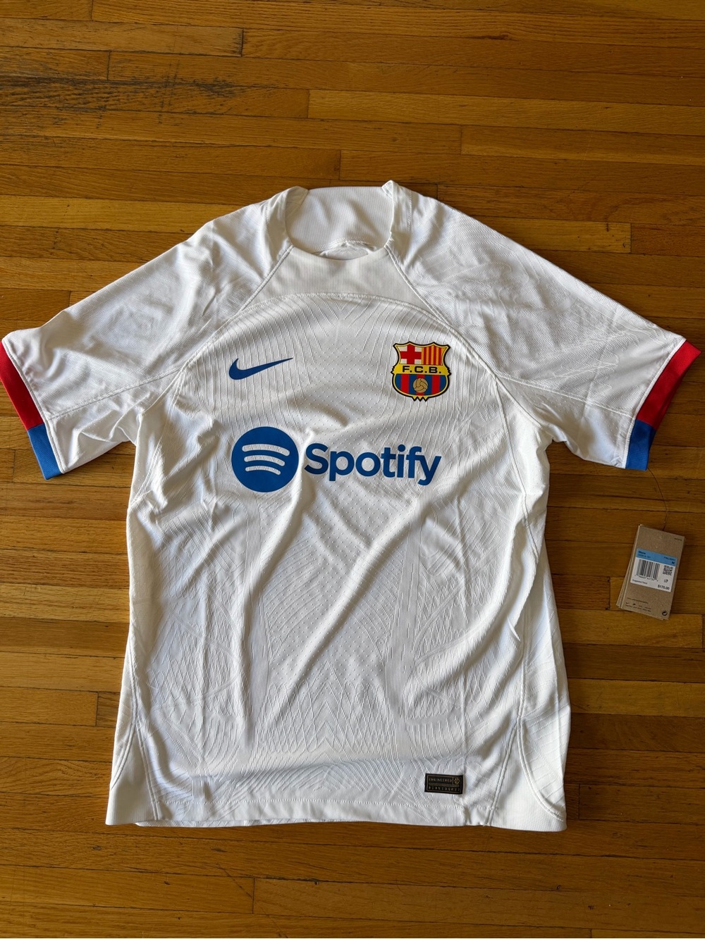 Nike White Soccer Jersey with Red and Blue Sleeve Trim